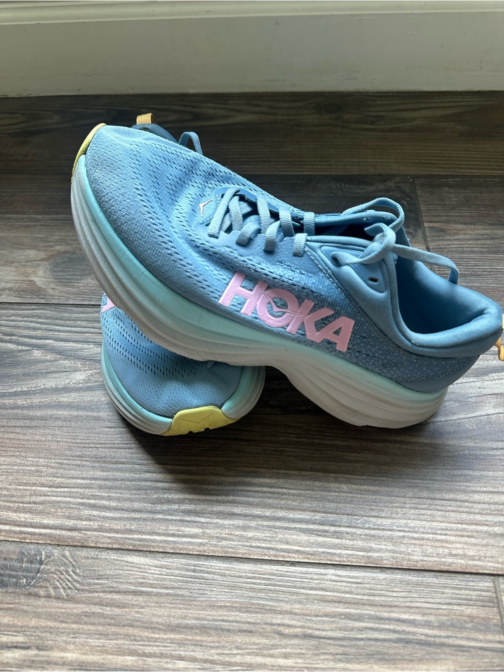 Hoka Women's Light Blue Running Shoes with Pink Logos